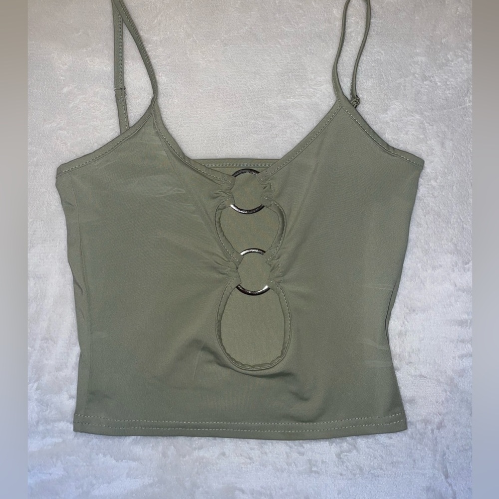 Green crop top with circular opening down front